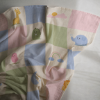 Peekaboo Patch Bamboo Muslin Swaddle